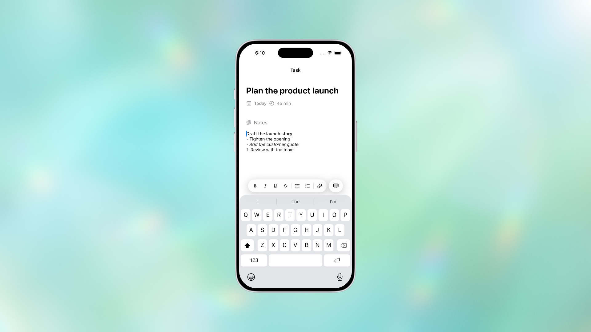 Ellie's iOS rich task-note editor with its formatting toolbar and software keyboard visible